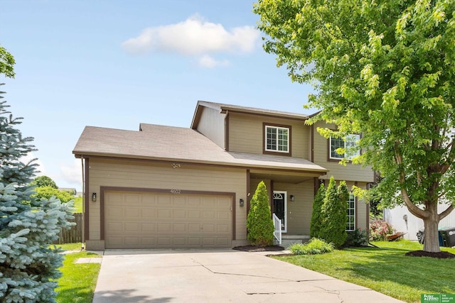 4602 N 155th Ave, Omaha, NE 68116 - view of front of house featuring a front lawn, a garage, and driveway