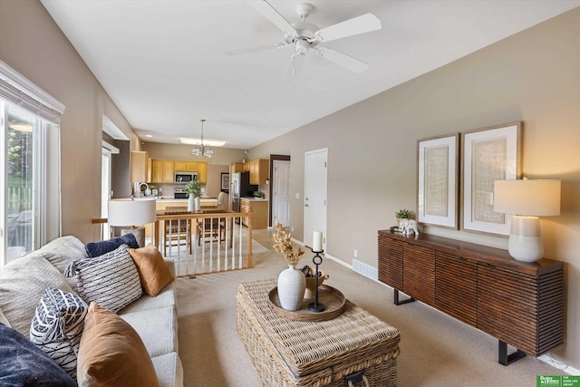 4602 N 155th Ave, Omaha, NE 68116 - living room with light colored carpet, ceiling fan, and baseboards