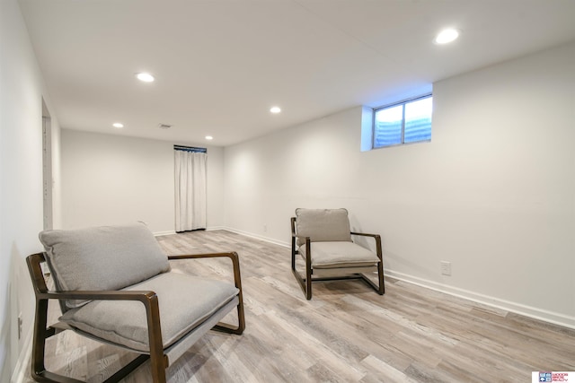 920 Clark Ave, Lincoln, NE 68510 - sitting room with light wood finished floors, baseboards, and recessed lighting