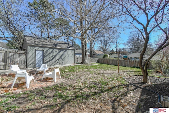 920 Clark Ave, Lincoln, NE 68510 - view of yard featuring an outbuilding and a patio