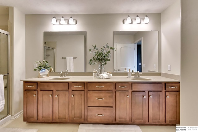 18337 Polk St, Omaha, NE 68135 - bathroom with a stall shower, double vanity, and tile patterned flooring
