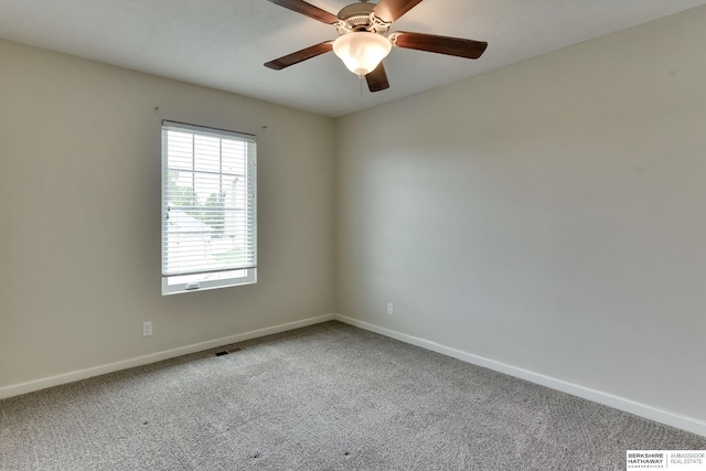 18337 Polk St, Omaha, NE 68135 - carpeted spare room featuring baseboards and ceiling fan