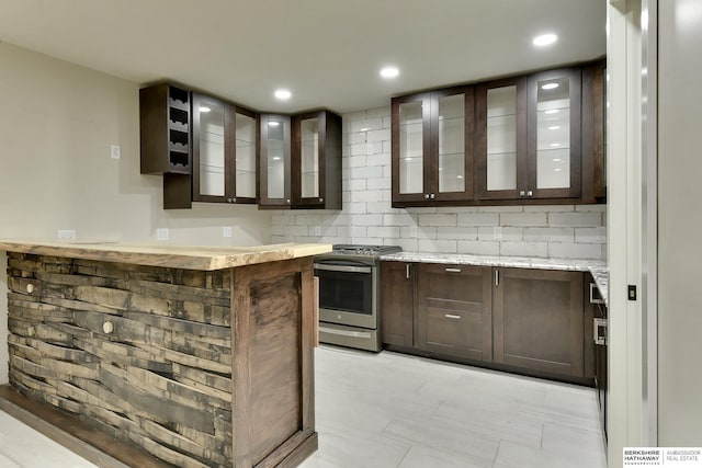 18337 Polk St, Omaha, NE 68135 - bar with gas range, decorative backsplash, and recessed lighting
