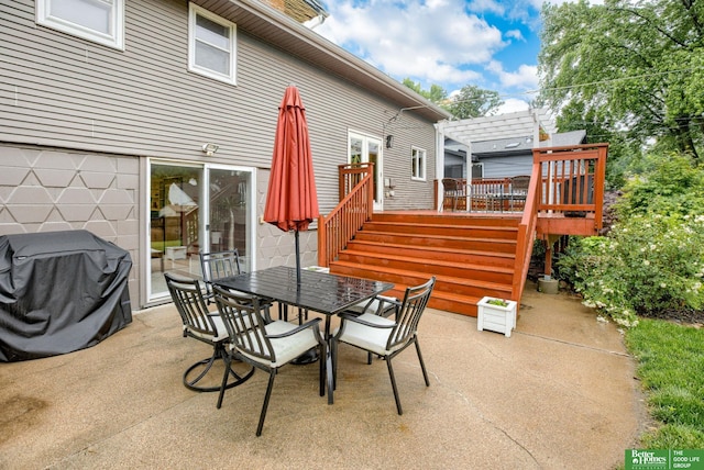 1008 J E George Blvd, Omaha, NE 68132 - view of patio with a pergola, a wooden deck, outdoor dining space, and stairway