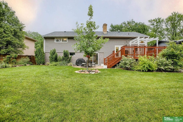 1008 J E George Blvd, Omaha, NE 68132 - back of property with a pergola, a chimney, a wooden deck, and a patio