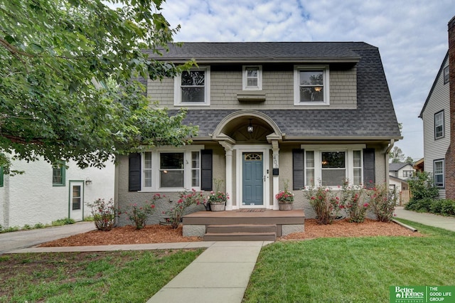 406 S 49th St, Omaha, NE 68132 - view of front facade featuring roof with shingles and a front yard