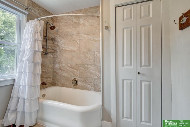 406 S 49th St, Omaha, NE 68132 - bathroom featuring a closet and shower / tub combo with curtain