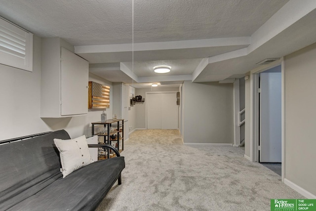 406 S 49th St, Omaha, NE 68132 - living area featuring light carpet, baseboards, and a textured ceiling
