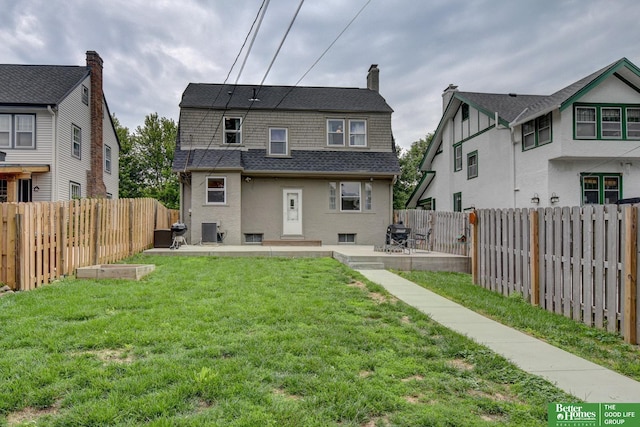 406 S 49th St, Omaha, NE 68132 - back of property featuring central AC, a patio area, a chimney, and roof with shingles