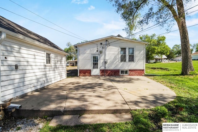 929 Main St, Seward, NE 68434 - back of house with a patio and a yard