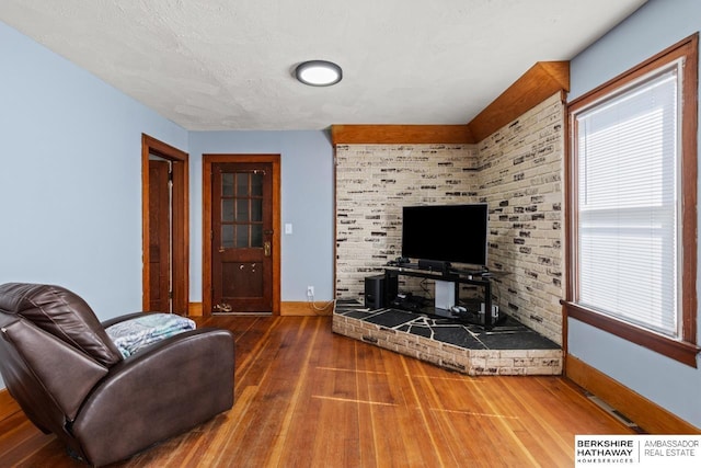 929 Main St, Seward, NE 68434 - living area with wood finished floors and baseboards