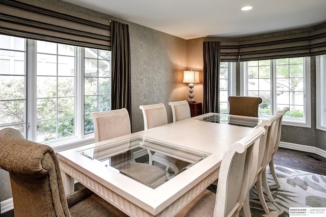 12829 Izard St, Omaha, NE 68154 - dining space with baseboards, dark wood-type flooring, and recessed lighting