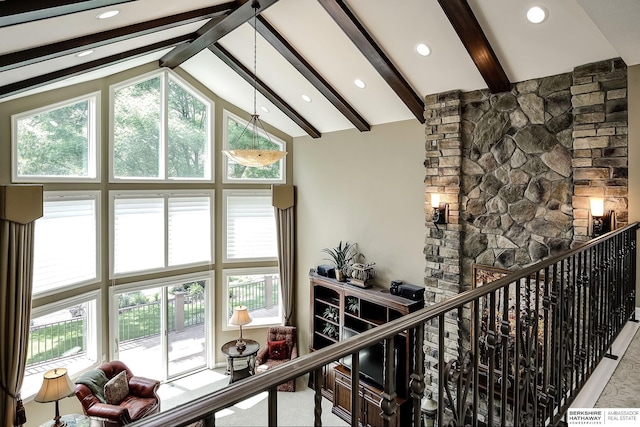 12829 Izard St, Omaha, NE 68154 - hallway featuring high vaulted ceiling, beam ceiling, plenty of natural light, recessed lighting, and an upstairs landing