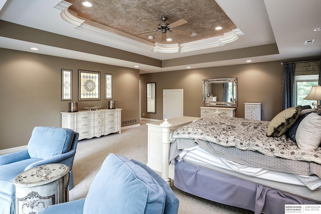 12829 Izard St, Omaha, NE 68154 - bedroom with a tray ceiling, light carpet, recessed lighting, baseboards, and crown molding