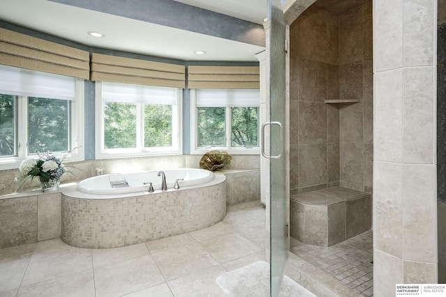 12829 Izard St, Omaha, NE 68154 - full bath with a bath, a shower stall, and tile patterned flooring