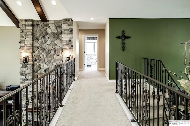 12829 Izard St, Omaha, NE 68154 - corridor featuring an upstairs landing, carpet flooring, beamed ceiling, baseboards, and recessed lighting