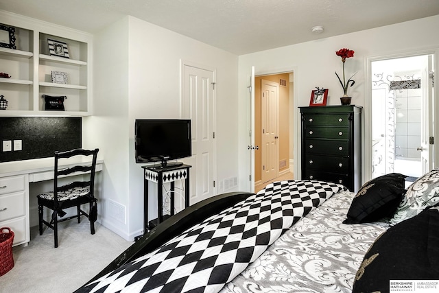 12829 Izard St, Omaha, NE 68154 - carpeted bedroom featuring baseboards and connected bathroom