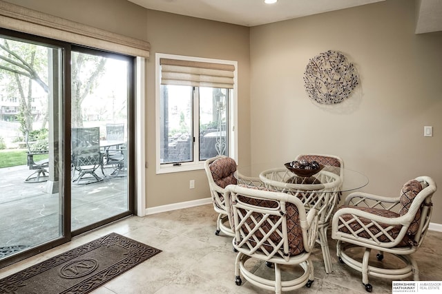 12829 Izard St, Omaha, NE 68154 - dining room featuring baseboards