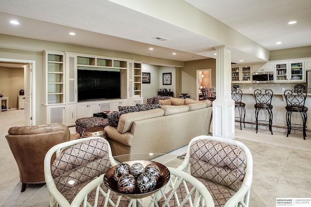 12829 Izard St, Omaha, NE 68154 - living area with decorative columns and recessed lighting