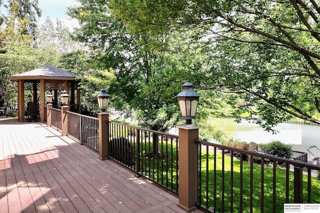 12829 Izard St, Omaha, NE 68154 - wooden deck with a gazebo, a water view, and a yard