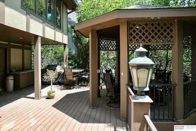 12829 Izard St, Omaha, NE 68154 - deck with a gazebo, outdoor dining space, and area for grilling