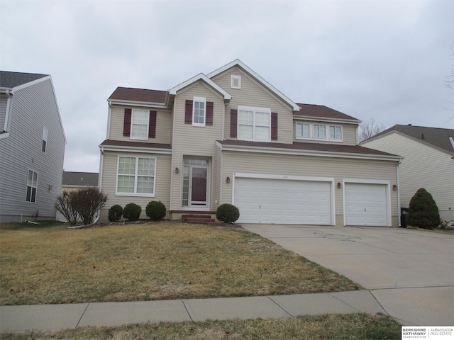 3113 N 169th St, Omaha, NE 68116 - traditional-style home with driveway, a front lawn, and a garage