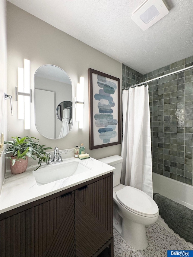 5941 Margo Dr, Lincoln, NE 68510 - full bathroom featuring toilet, vanity, and a textured ceiling