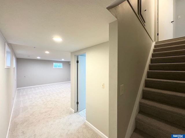 5941 Margo Dr, Lincoln, NE 68510 - stairway featuring carpet floors, recessed lighting, and baseboards