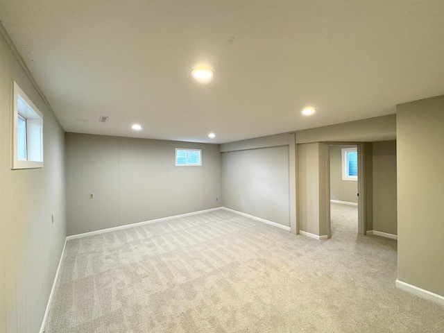 5941 Margo Dr, Lincoln, NE 68510 - basement featuring recessed lighting, light carpet, baseboards, and plenty of natural light