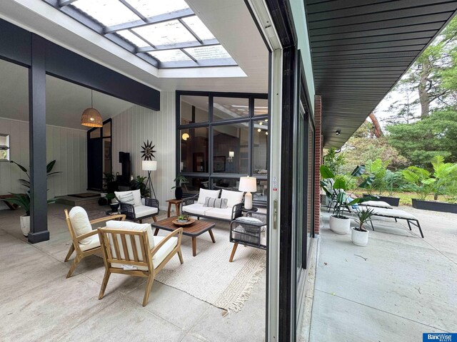 5941 Margo Dr, Lincoln, NE 68510 - view of patio / terrace featuring outdoor lounge area