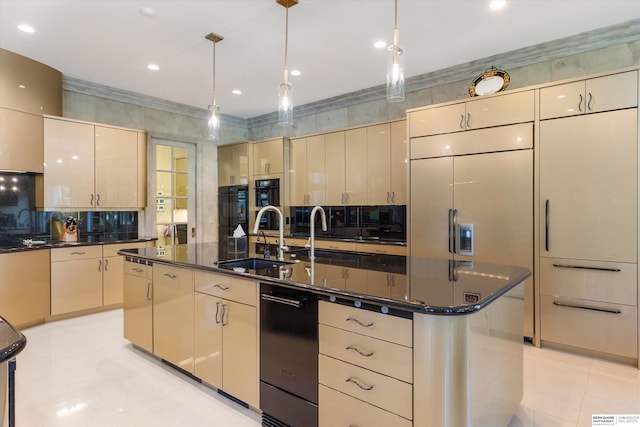 1215 N 136th St, Omaha, NE 68154 - kitchen with a sink, cream cabinets, an island with sink, backsplash, and hanging light fixtures