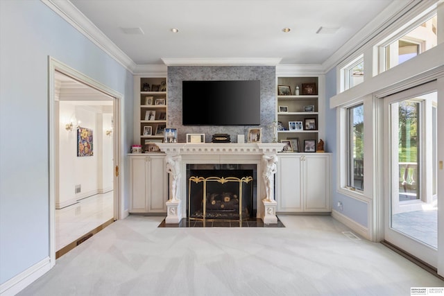 1215 N 136th St, Omaha, NE 68154 - living room with built in shelves, baseboards, crown molding, light carpet, and a fireplace with flush hearth