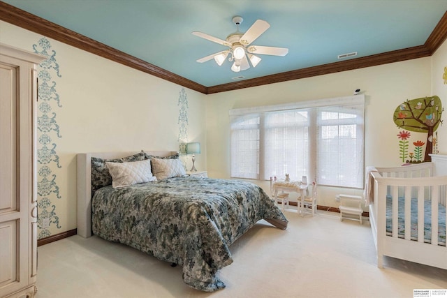 1215 N 136th St, Omaha, NE 68154 - bedroom with ornamental molding, light carpet, baseboards, and a ceiling fan