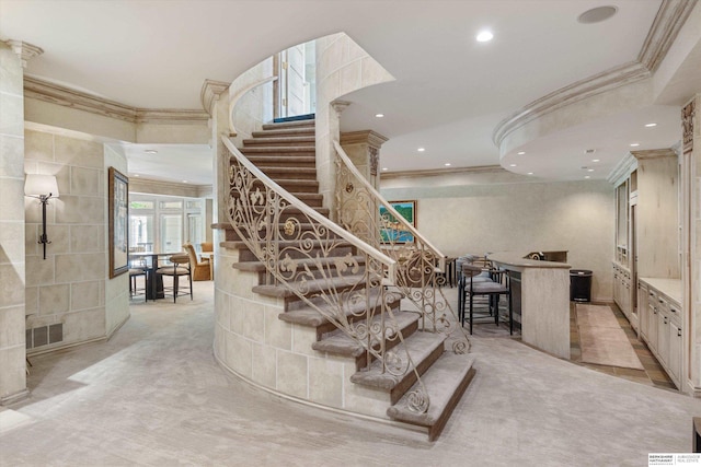1215 N 136th St, Omaha, NE 68154 - stairs with ornamental molding, recessed lighting, and carpet flooring