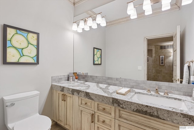 1215 N 136th St, Omaha, NE 68154 - full bath with double vanity, toilet, and crown molding