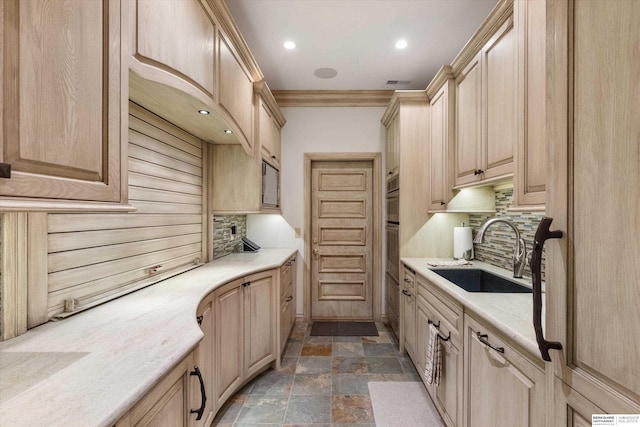 1215 N 136th St, Omaha, NE 68154 - kitchen with a sink, light brown cabinetry, decorative backsplash, recessed lighting, and crown molding