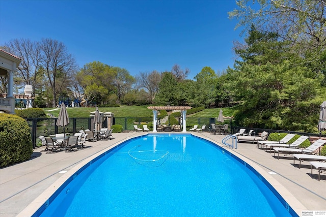 1215 N 136th St, Omaha, NE 68154 - community pool with a patio and view of scattered trees