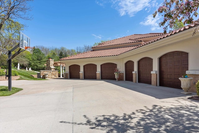 1215 N 136th St, Omaha, NE 68154 - view of side of home with a tile roof and stucco siding