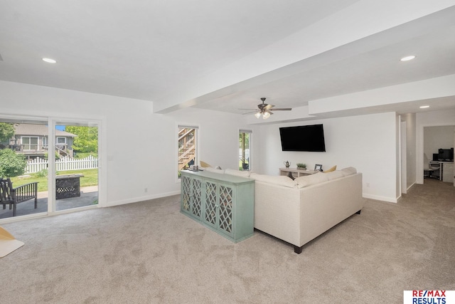 21808 Hilltop Ave, Gretna, NE 68028 - living room featuring light carpet, a ceiling fan, and recessed lighting