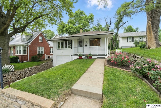 6236 Poppleton Ave, Omaha, NE 68106 - bungalow-style home with a porch, a garage, and a front yard