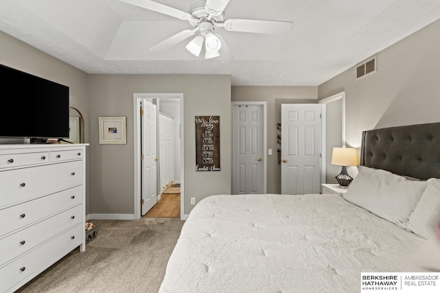 16325 Erskine St, Omaha, NE 68116 - bedroom featuring light carpet, baseboards, ensuite bathroom, and ceiling fan