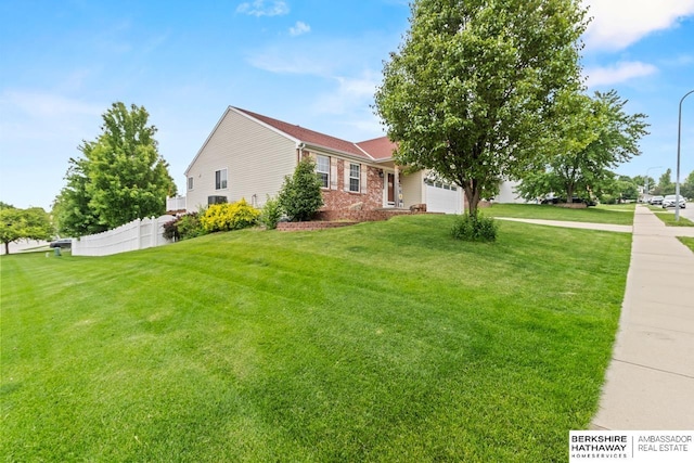 16325 Erskine St, Omaha, NE 68116 - view of front of house with an attached garage and brick siding
