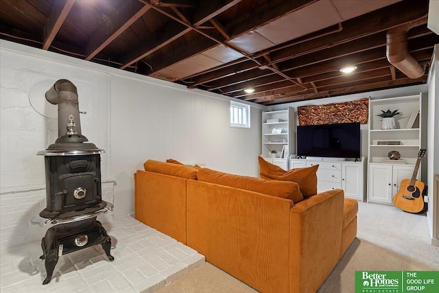 816 S 49th St, Omaha, NE 68106 - living area with carpet and a wood stove