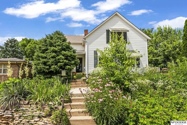 15410 Bennington Rd, Bennington, NE 68007 - view of front of home featuring a chimney