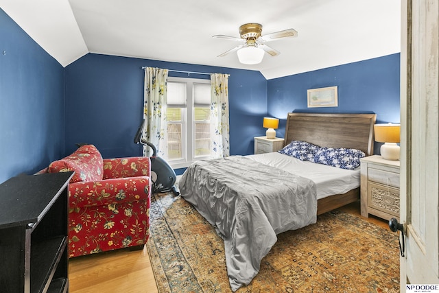 15410 Bennington Rd, Bennington, NE 68007 - bedroom with vaulted ceiling, wood finished floors, and ceiling fan