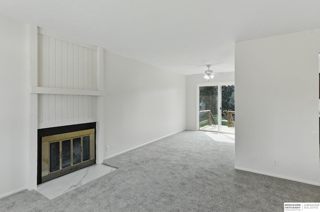 13304 S 21st St, Bellevue, NE 68123 - unfurnished living room with a ceiling fan, carpet, and a fireplace