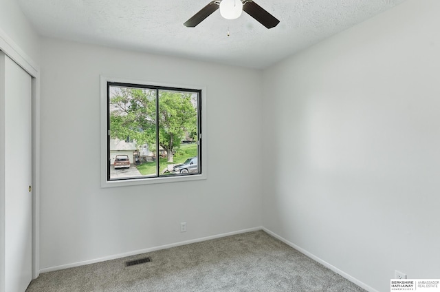 13304 S 21st St, Bellevue, NE 68123 - carpeted spare room featuring ceiling fan and a textured ceiling