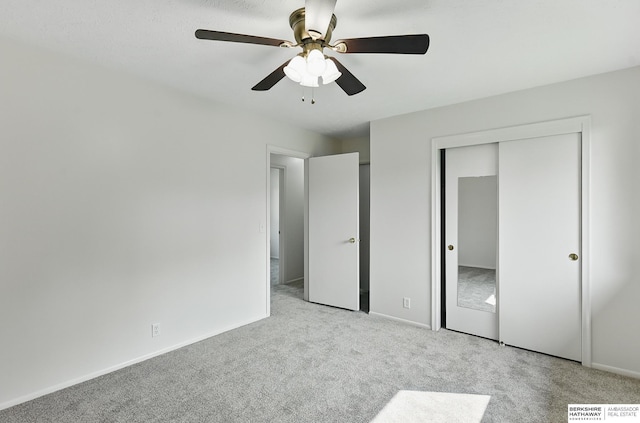 13304 S 21st St, Bellevue, NE 68123 - unfurnished bedroom with carpet, a closet, and ceiling fan