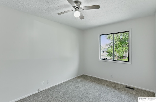 13304 S 21st St, Bellevue, NE 68123 - carpeted spare room featuring a textured ceiling and a ceiling fan