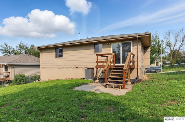 13304 S 21st St, Bellevue, NE 68123 - back of property with a fenced backyard, a deck, and stairway